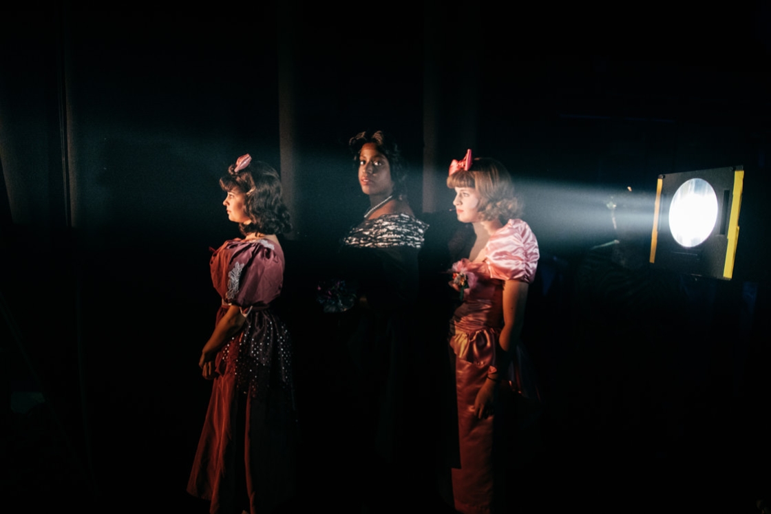 Three actresses in &quot;Into the Woods&quot; backstage, light by light from behind
