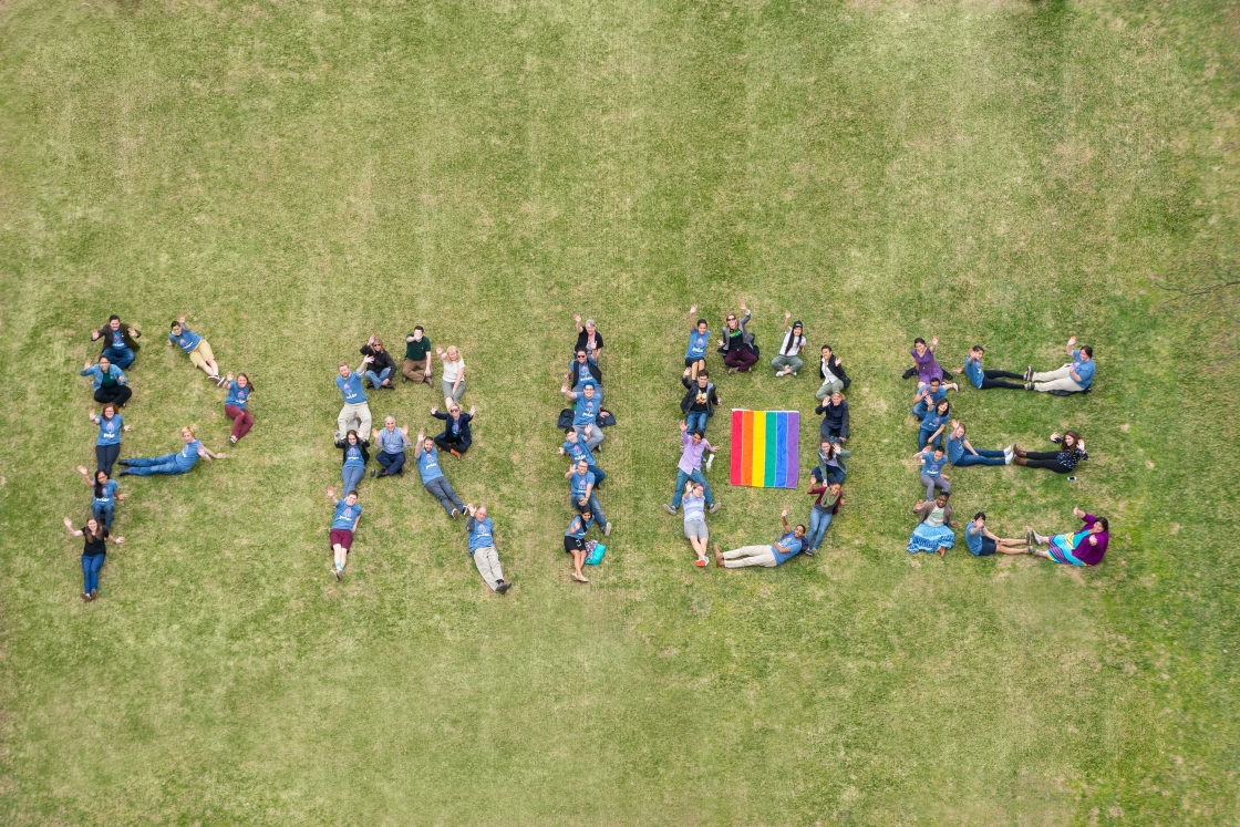 People spell out pride.