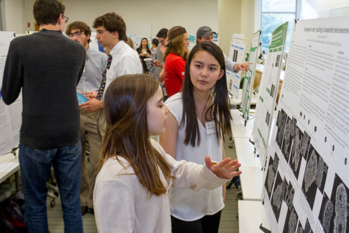 Students check out the research posters at the 2017 Wetterhahn symposium.