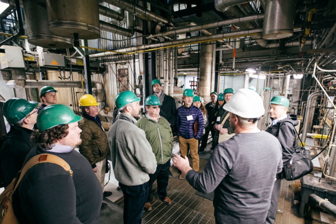Representatives tour the College’s existing heating plant