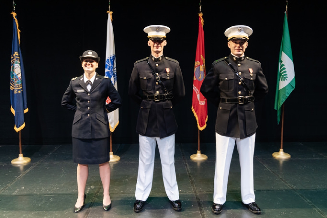 Alexandra Crosswait ’19, Frederick Polak ’19, and Austen Robinson ’19 get a round of applause after receiving their commissions as officers.