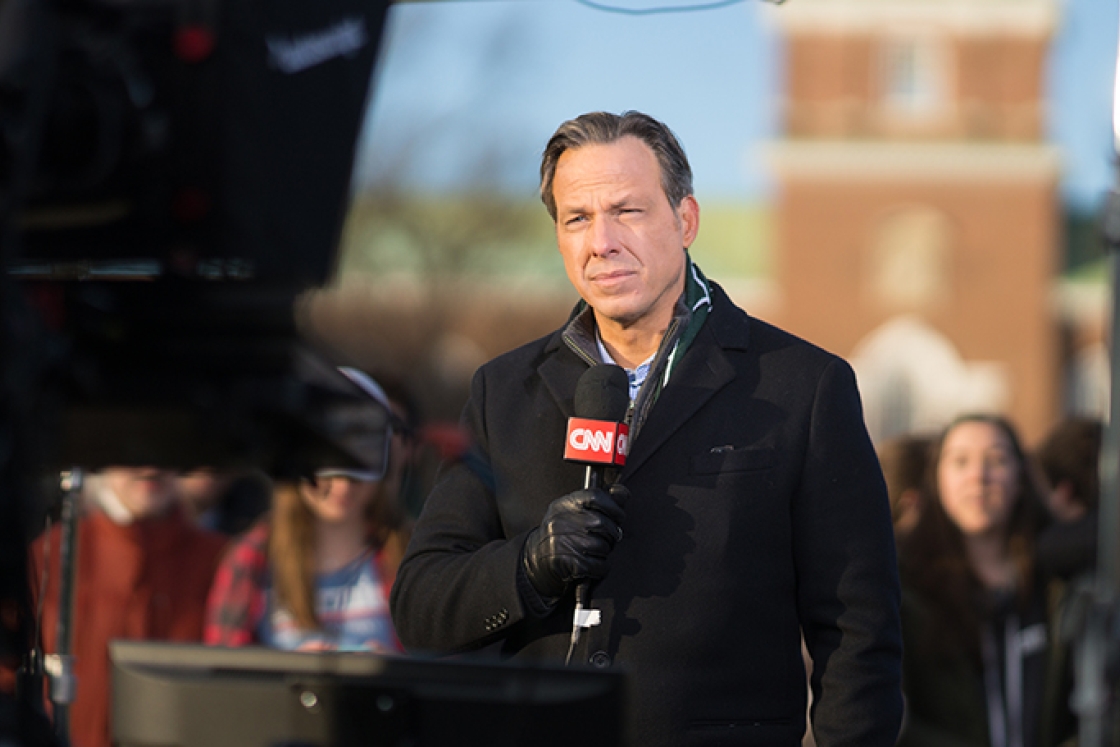 Jake Tapper reporting for CNN from the Dartmouth Green