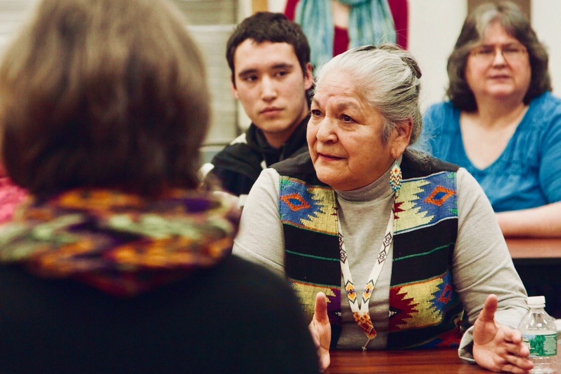 In this scene from Dawnland, Georgina Sappier-Richardson shares her story at a Truth and Reconciliation Commission community visit. At 2 years old, Sappier-Richardson was removed from her home and Passamquoddy community by Maine's child protection service
