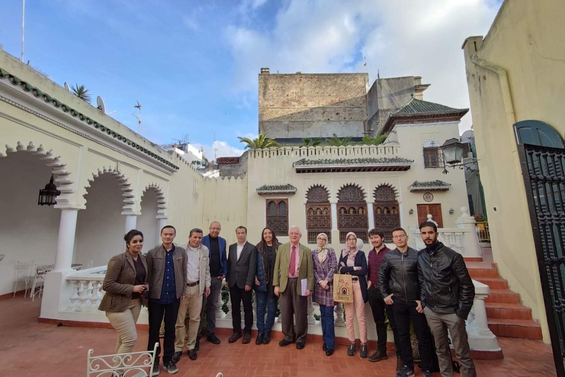 Dale Eickelman, center, poses with Moroccan sociologist Fadma Ait Mous, right, and Moroccan, Chinese, and American participants in a pre-doctoral workshop at the Tangier American Legation Institute for Moroccan Studies in February 2020.