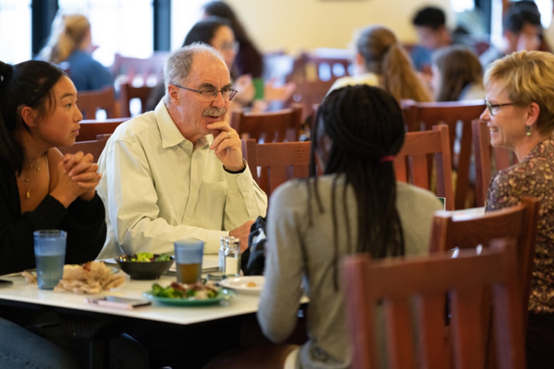 President Philip J. Hanlon '77 and Dean of the Faculty Elizabeth Smith talk with students at a lunchtime series with senior leaders that begins again this week. (Photo by Eli Burakian)
