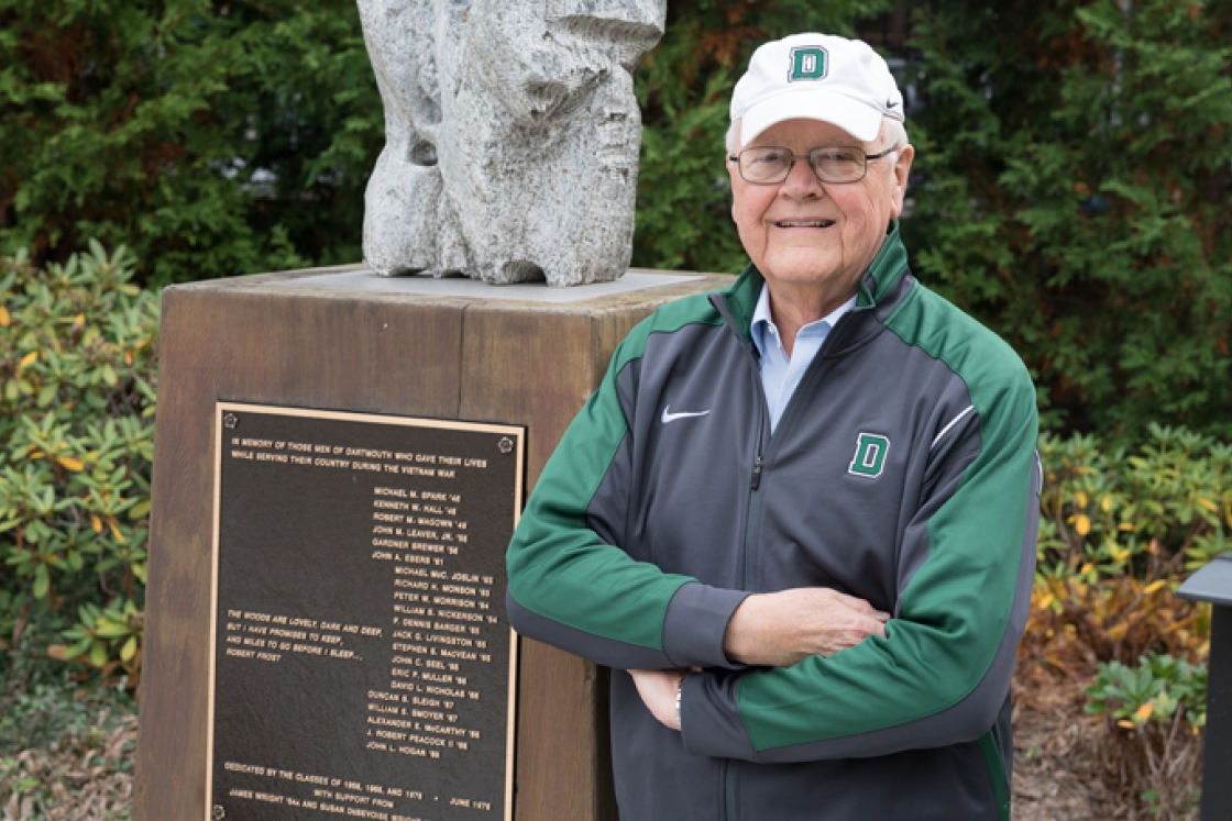 President Emeritus James Wright stands by the rededicated Vietnam War memorial plaque