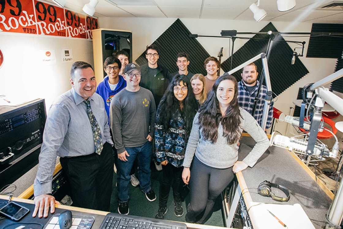 student leaders of Dartmouth Broadcasting in a studio at 99Rock