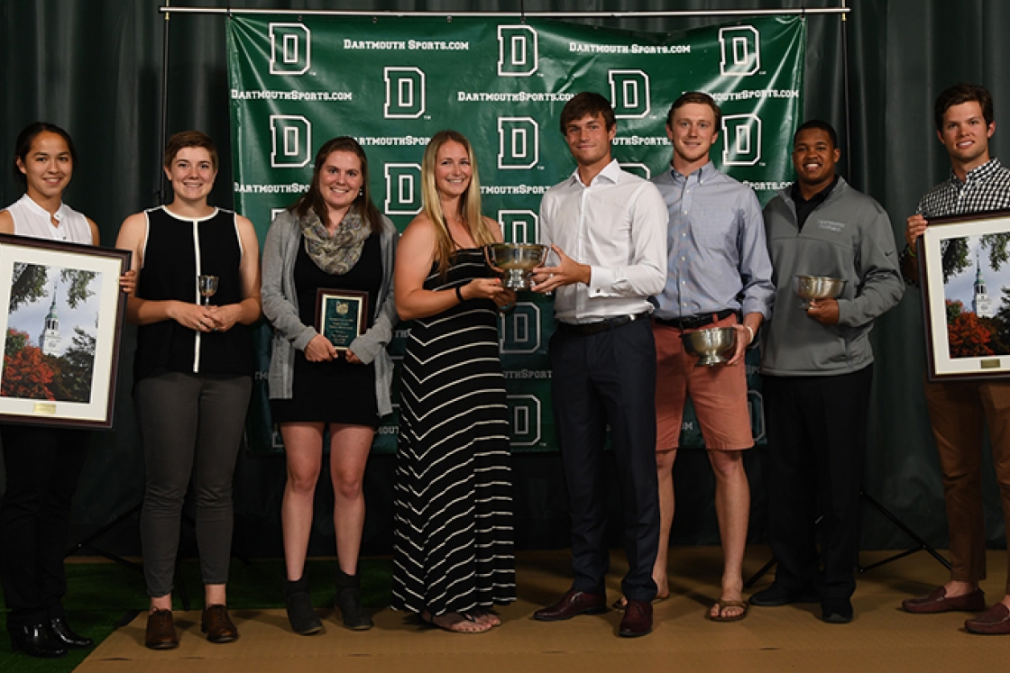 Some of the student-athletes hold their awards after the ceremony.