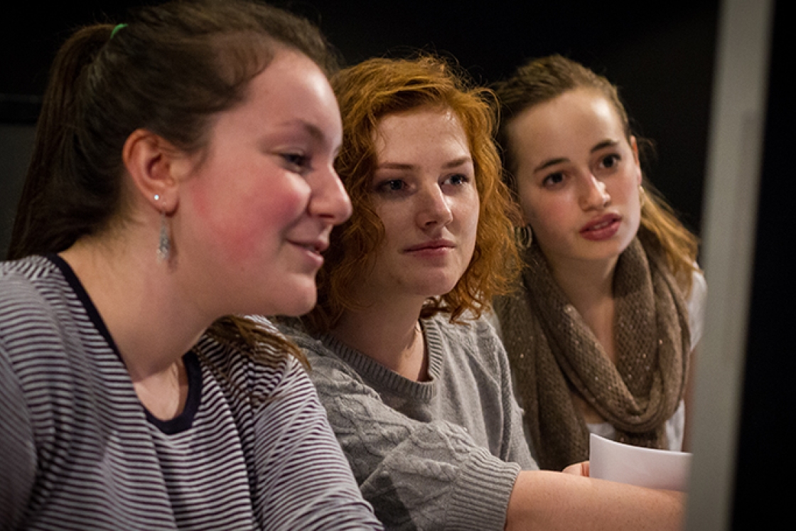 :) Jaclyn Pageau ’18, left, Lela Gannon ’18, center, and Tess McGuinness ’18 prepare for a rehearsal of Orwell