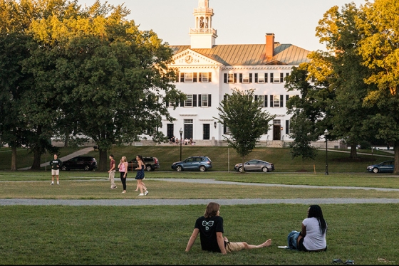 Students relaxing and playing on the Green
