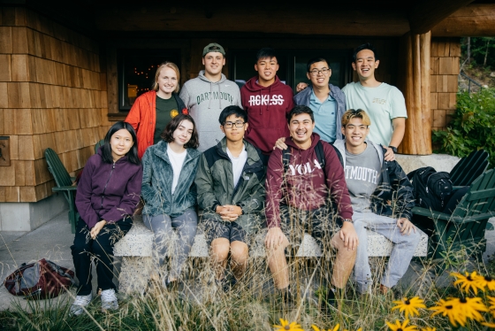 Students pose in front of Moosilauke Lodge