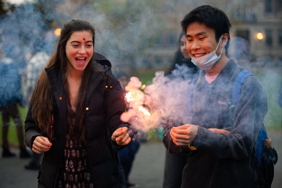 Two people with sparklers