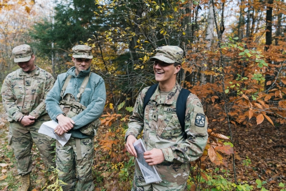 Three ROTC members smiling