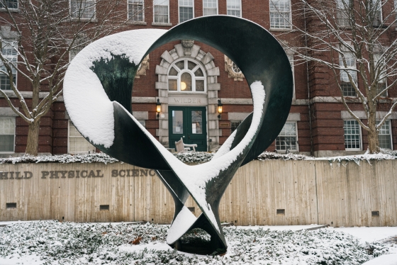 Metal sculpture covered in snow