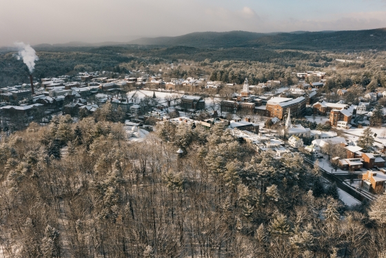 an aerial view of campus with fresh snow