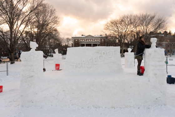 A snow sculpture with four pillars and the carving reading &quot;top secret&quot;