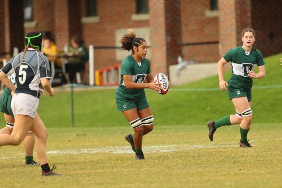 Dartmouth women playing rugby