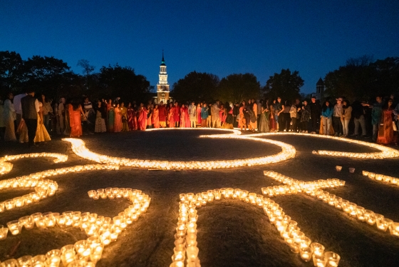 Diwali candles on the Green that spell out &quot;Shanti&quot;