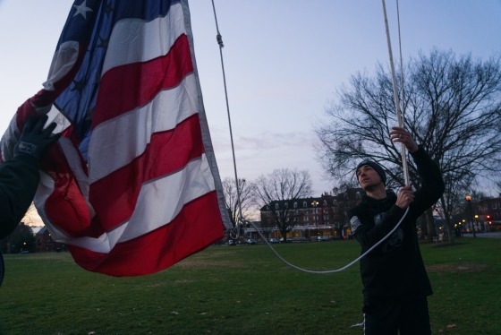 Jason Mosel raises the flag on Dartmouth campus