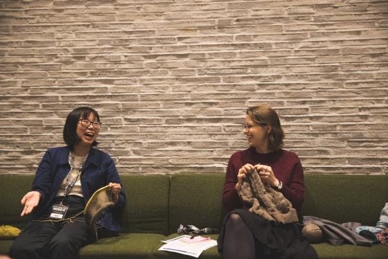 Jayde Xu and Elizabeth Rice Mattison talk while knitting at the HOOD museum.