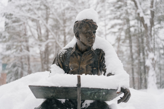The Robert Frost statue covered in snow