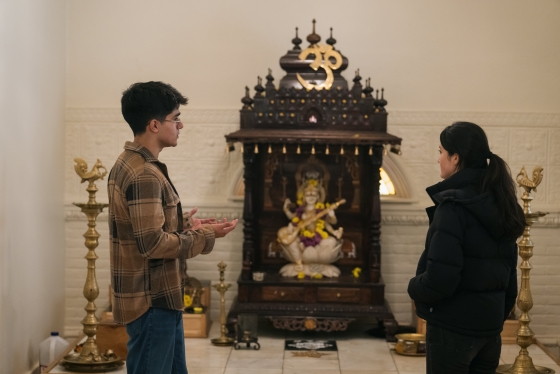 Varun Wescott and another student in the Hindu temple at Rollins Chapel