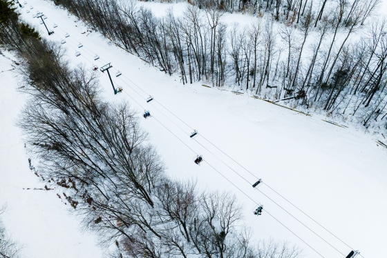 Aerial of skiers on the lift at the Dartmouth skiway