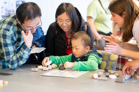A family enjoys Science Day at the Life Sciences Center.