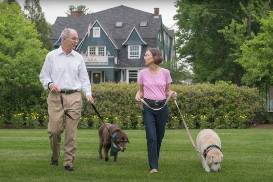 Phil and Gail walking their dogs