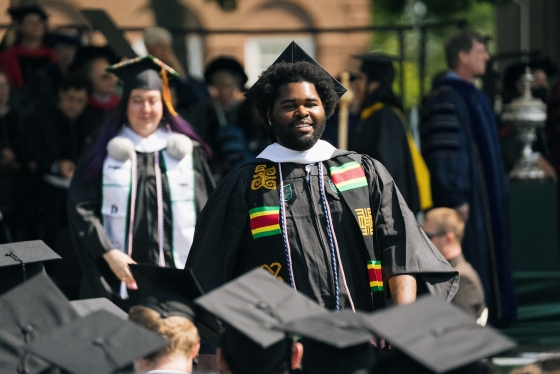 Student marches in during Commencement