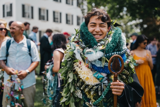 Dartmouth student wears many leis at Commencement
