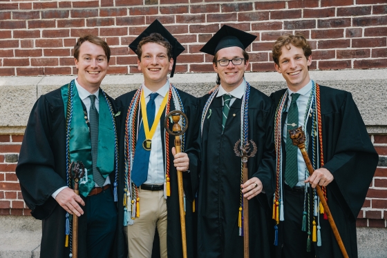 Four students pose for their picture at Dartmouth College Commencement