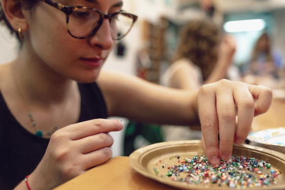 Leyla Jacoby selecting beads