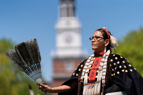 Native American woman performing ath Powwow