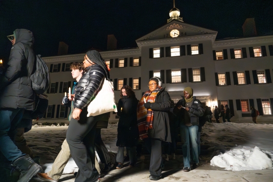 Students attend a candlelight vigil in front of Dartmouth Hall