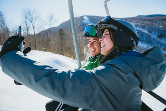 President Beilock and student take a selfie on the chairlift