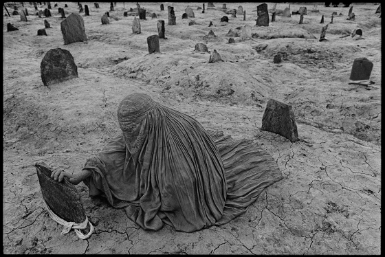 Woman in burkha in graveyard
