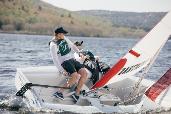 Students on the sailing team practice on Mascoma Lake