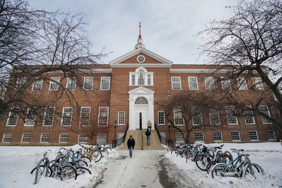 Baker Library's west entrance with bicycles in snow