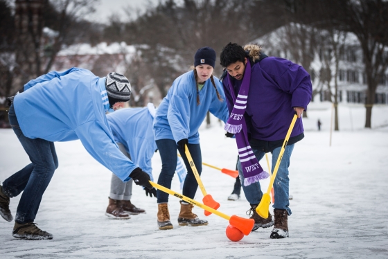 School House versus West House playing broom ball