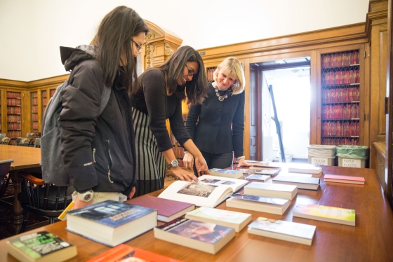 Students examine new additions to the library