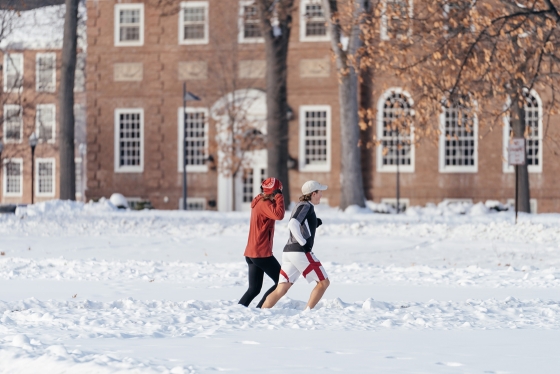 Students run across campus