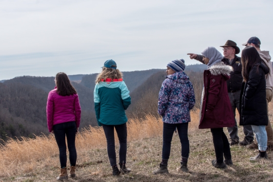 Students examine a mountaintop