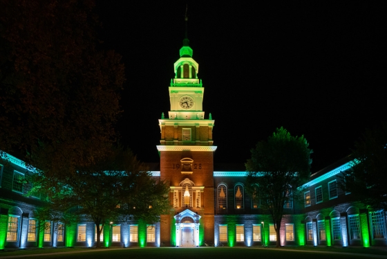 Baker Library aglow in green.