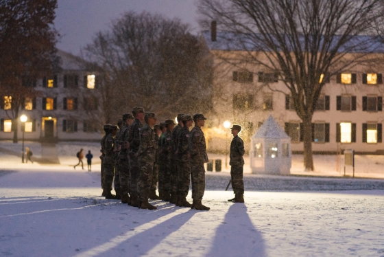 Gathered in two lines, cadets cast long shadows on the Green.