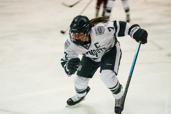 Christina Rombaut '20, a forward on the women's hockey team and a biology major, faces off against Colgate.