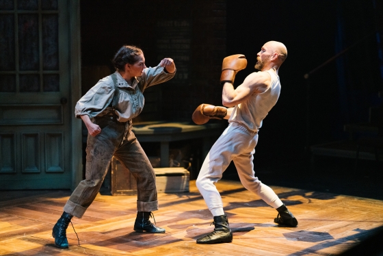 Two characters in the play, 'The Sweet Science of Bruising' box