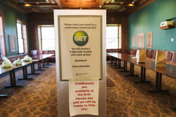 Students who are still on campus use the GET app to preorder their meals, which they pick up in Pagnucci Lounge in '53 Commons. The orders are placed in bags and organized by last name. Around two-thirds of students who are on campus typically get their f