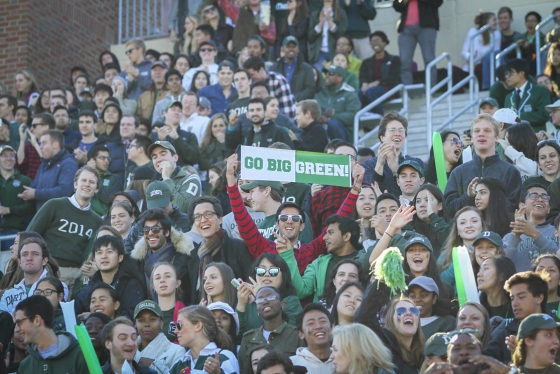 Students donning their Dartmouth gear cheer the Dartmouth football team on to a 35-3 win against Yale during 2015's homecoming.