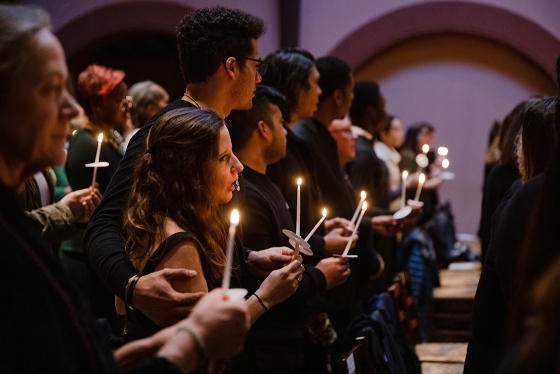Students sing with candles at Dartmouth MLK candlelight ceremony